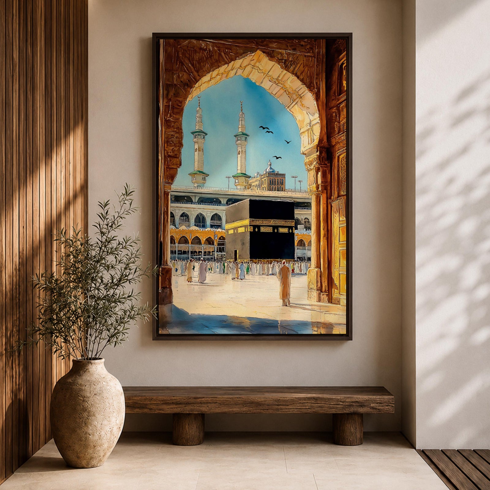 Watercolor style artwork showing the Kaaba at Masjid Al Haram in Mecca framed through a large golden mosque arch, with pilgrims gathered around the courtyard and two tall minarets rising against a clear blue sky.