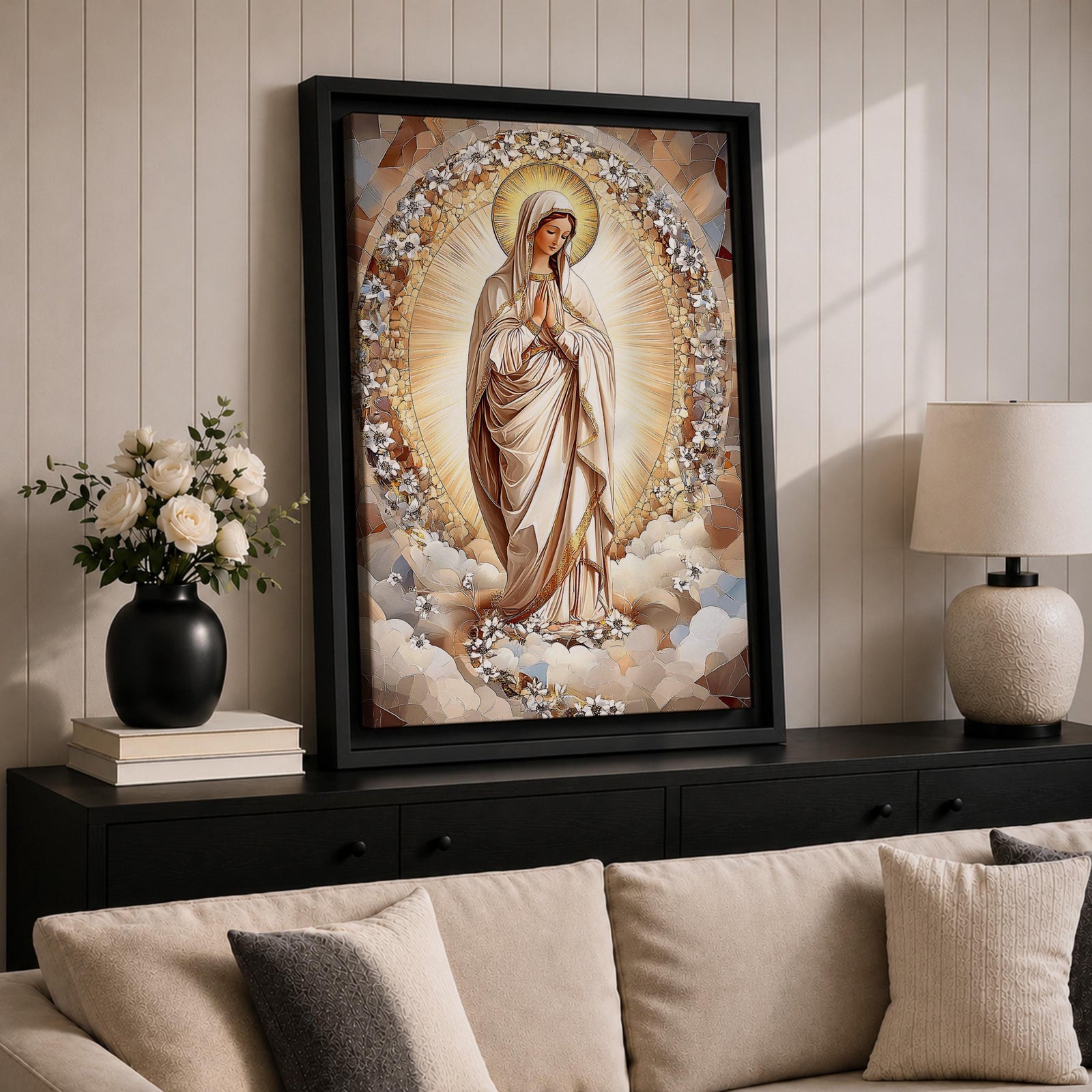 Mosaic style artwork of the Virgin Mary standing with hands folded in prayer, surrounded by a radiant golden halo and a decorative floral arch composed of small mosaic tiles and delicate blossoms, rendered in soft neutral and golden tones forming a serene Catholic devotional portrait.