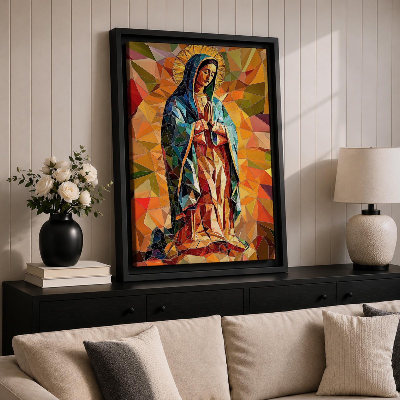 A vibrant mosaic-style stained glass depiction of Our Lady of Guadalupe shows her with hands clasped in prayer, wearing a blue mantle and surrounded by geometric colorful shapes, capturing the traditional Mexican Marian apparition in a modern abstract mosaic composition.