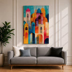 Colorful abstract artwork featuring layered mosque domes, arches, and minarets in vibrant blue, orange, red, and yellow tones, forming a stylized Islamic architectural skyline.