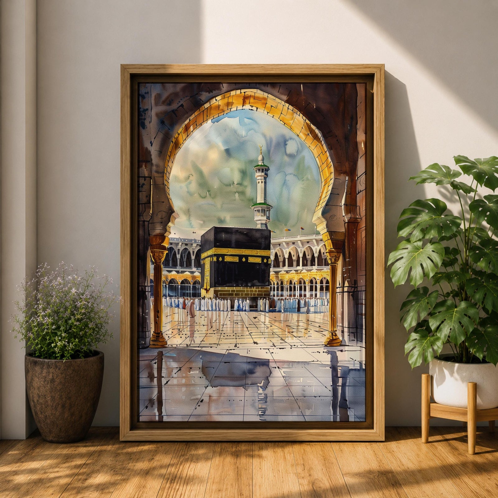 Watercolor-style painting of the Kaaba at Masjid Al Haram in Mecca viewed through a large mosque archway, with pilgrims standing in the courtyard and a tall minaret rising behind the sacred shrine.