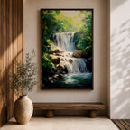 A framed canvas painting of a tropical waterfall cascading over rocks surrounded by lush green forest foliage, rendered in a realistic style with detailed water flow and vibrant natural elements, capturing the serene beauty of a forest landscape.