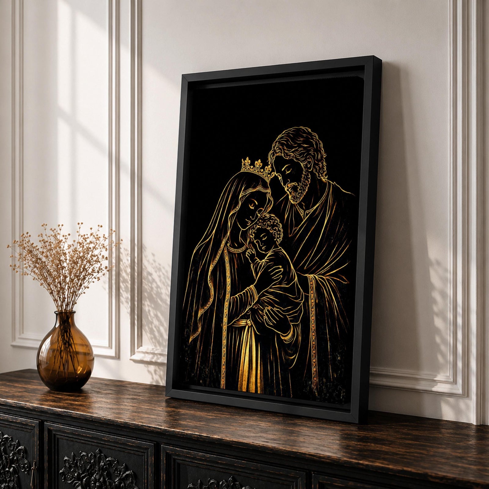 Elegant gold line illustration of the Holy Family showing Mary, Joseph, and baby Jesus embraced together, drawn in glowing gold lines on a deep black background creating a minimalist Catholic devotional artwork.
