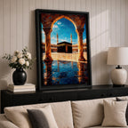 Framed wall art showing the Kaaba at Masjid Al Haram in Mecca viewed through a grand marble archway with columns and reflective courtyard tiles under a bright blue sky.