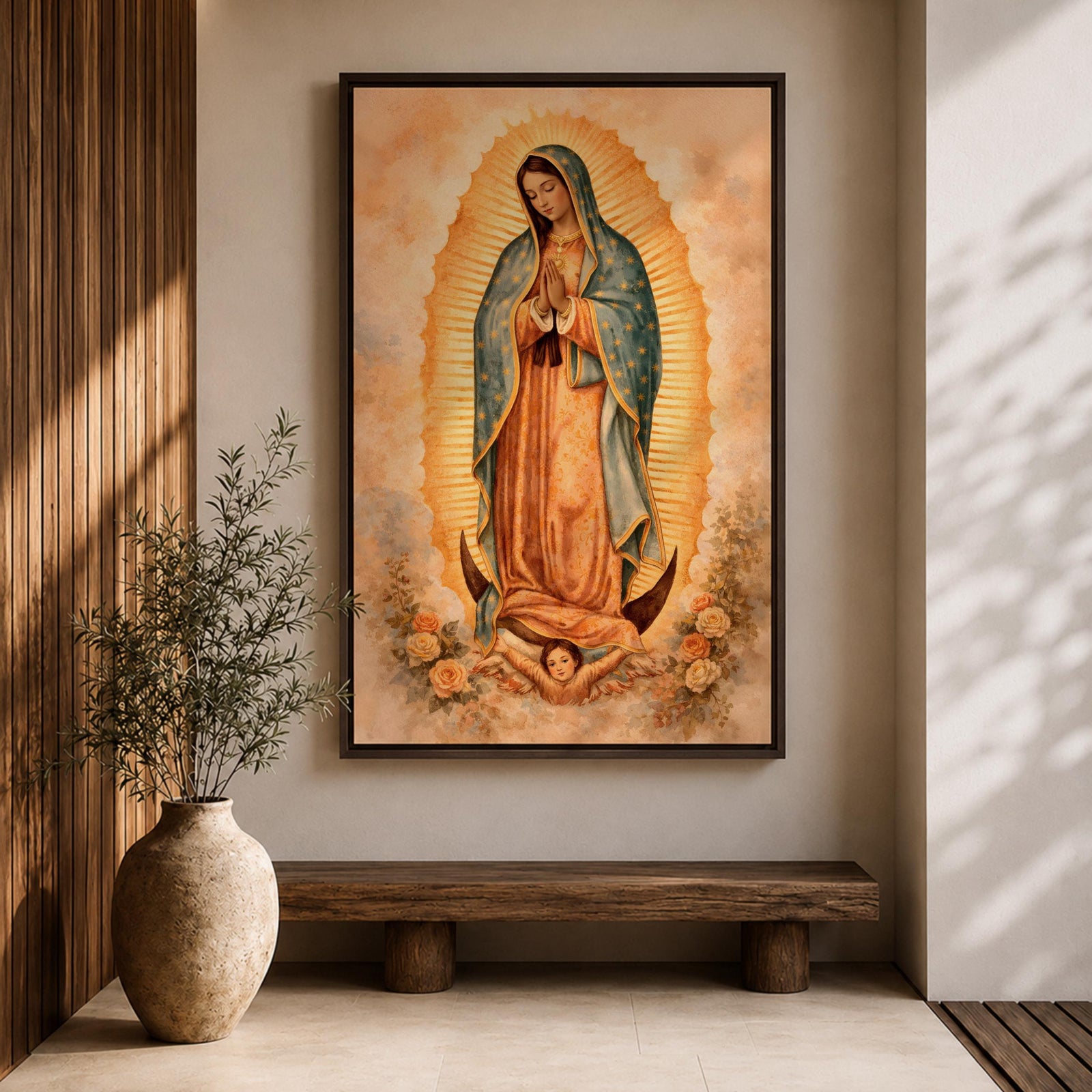 Painting of Our Lady of Guadalupe standing in a prayer pose with hands clasped and head bowed, wearing a flowing rose colored gown and a blue mantle decorated with stars, surrounded by radiant golden rays forming an oval halo, standing on a crescent moon supported by a small angel in traditional Catholic devotional style.