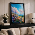 A vibrant impasto painting of a wildflower meadow featuring dense clusters of colorful flowers under a bright blue sky with fluffy clouds. The textured brushstrokes create depth and movement, capturing a lively natural landscape scene with rolling hills in the distance.