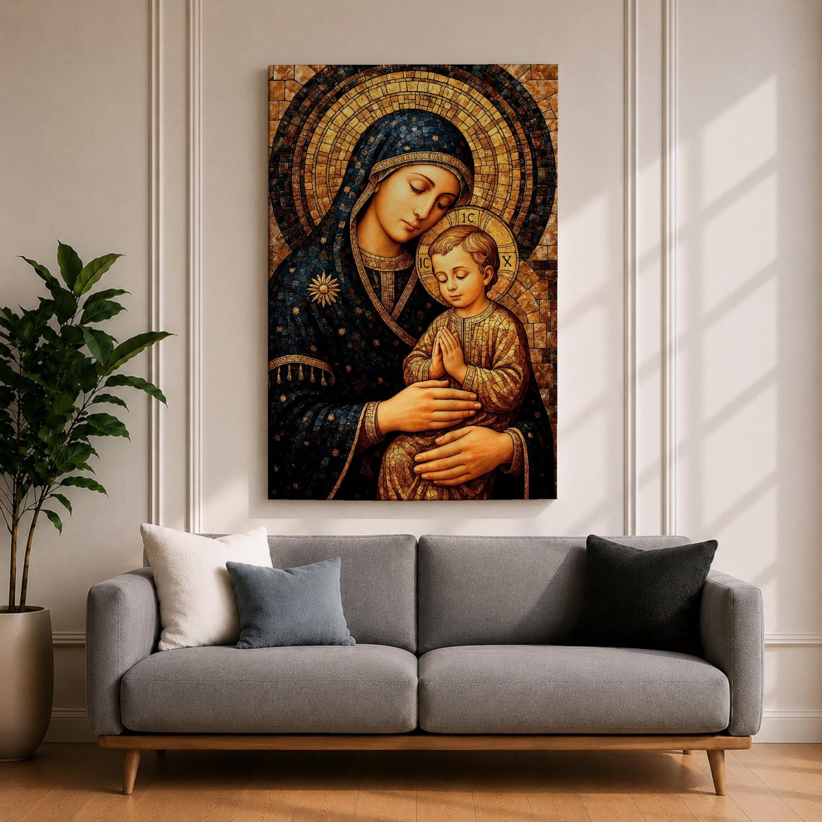 Byzantine style mosaic painting of the Virgin Mary holding the child Jesus, both with heads gently inclined and halos behind them, the child shown with hands clasped in prayer while Mary supports him, rendered with golden mosaic tiles and rich dark blue garments in a traditional Christian icon composition.