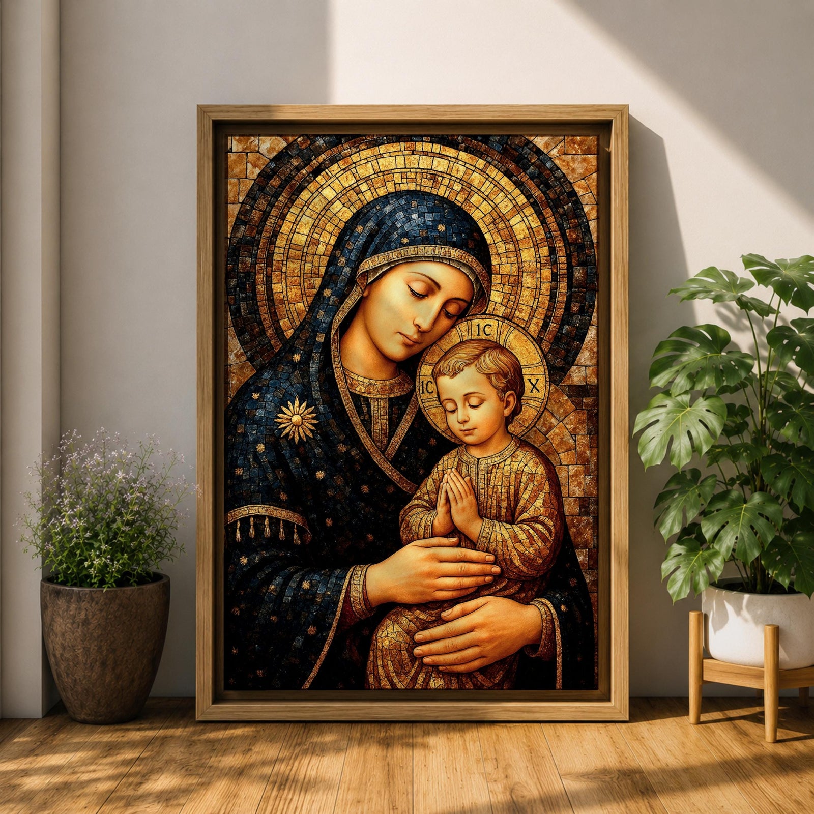 Byzantine style mosaic painting of the Virgin Mary holding the child Jesus, both with heads gently inclined and halos behind them, the child shown with hands clasped in prayer while Mary supports him, rendered with golden mosaic tiles and rich dark blue garments in a traditional Christian icon composition.