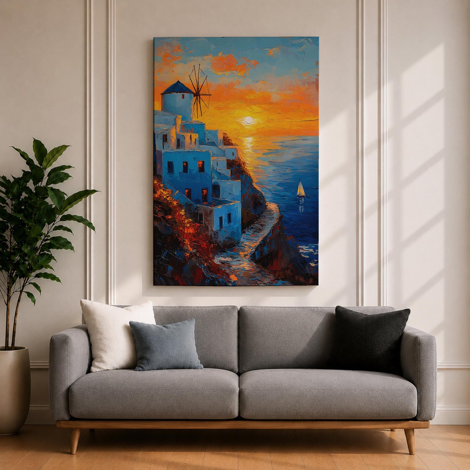An impasto style framed canvas painting depicting a Santorini sunset over whitewashed buildings with a windmill on a cliffside overlooking the sea. The vibrant sunset sky reflects on the water with a small sailboat visible, capturing a Mediterranean coastal landscape scene with textured brushstrokes.