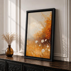 A vintage-style framed canvas depicting autumn wildflowers with white petals and golden foliage in an impressionistic, rustic floral composition. The artwork features textured brushstrokes and warm tones evoking a cozy cottagecore aesthetic.