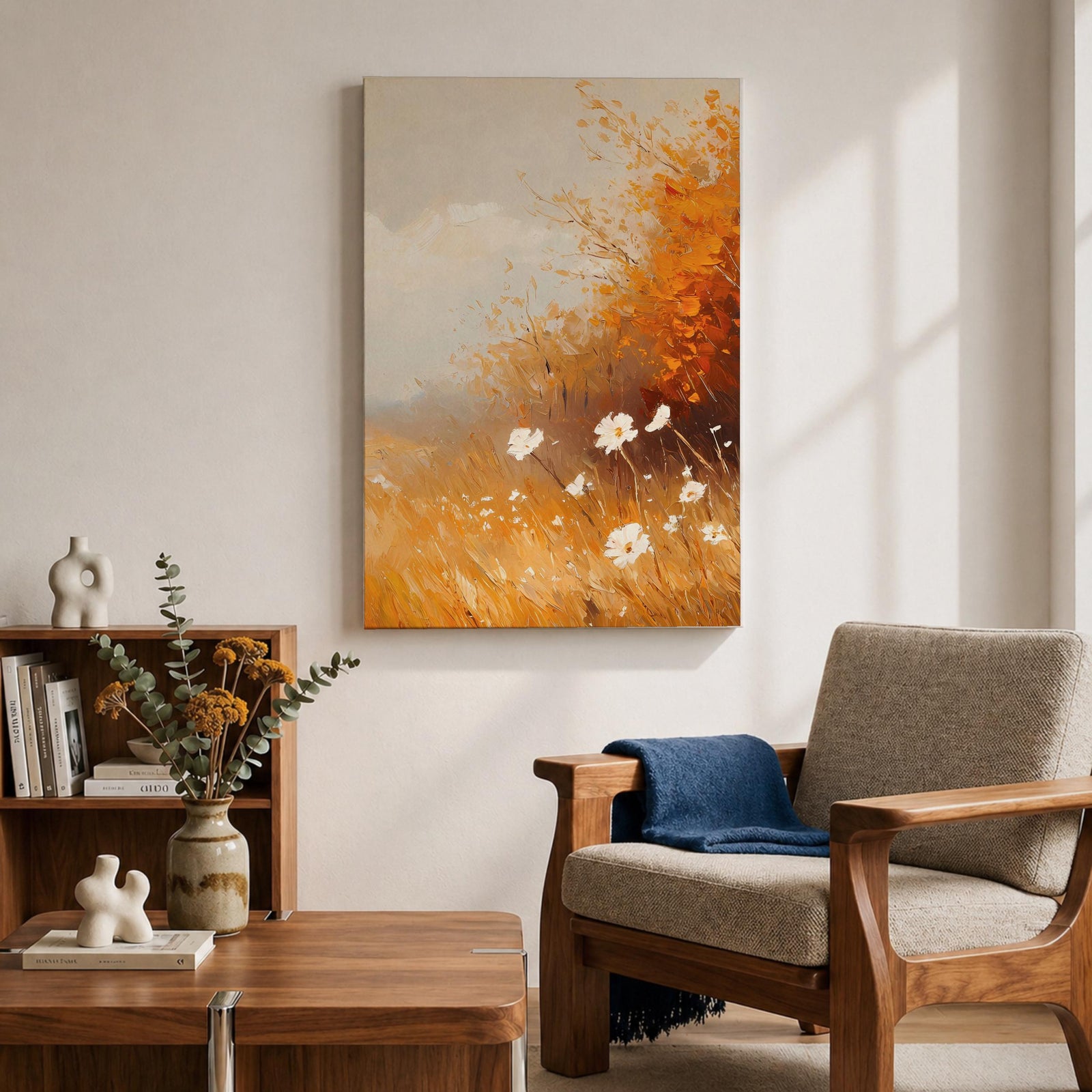 A vintage-style framed canvas depicting autumn wildflowers with white petals and golden foliage in an impressionistic, rustic floral composition. The artwork features textured brushstrokes and warm tones evoking a cozy cottagecore aesthetic.