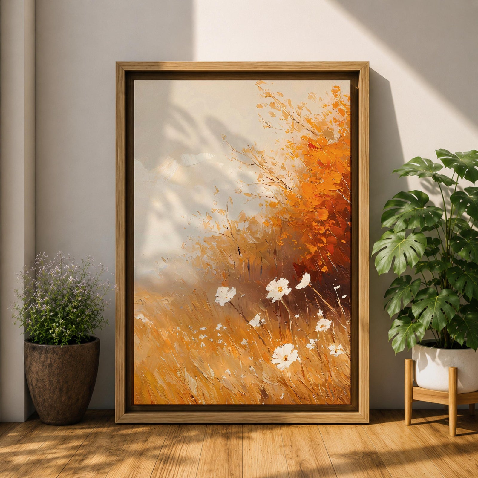 A vintage-style framed canvas depicting autumn wildflowers with white petals and golden foliage in an impressionistic, rustic floral composition. The artwork features textured brushstrokes and warm tones evoking a cozy cottagecore aesthetic.