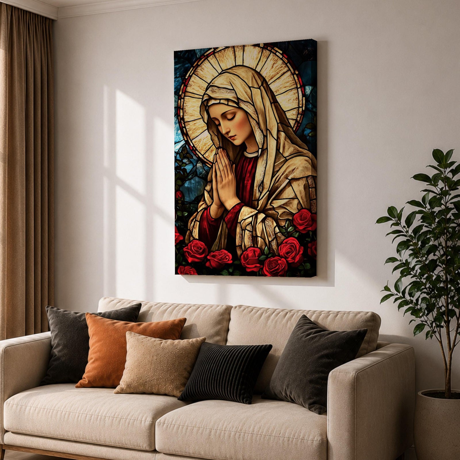 Stained glass style artwork of the Virgin Mary with head bowed and hands clasped in prayer, wearing a cream veil and red garment, surrounded by a radiant circular halo and red roses at the base, rendered with detailed stained glass panels and rich colors in a devotional Marian composition.