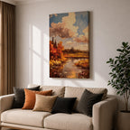 A framed impasto style painting depicting an autumn landscape with a river flowing through vibrant fall foliage and trees under a partly cloudy sky, rendered with textured brushstrokes emphasizing the rustic natural scene.