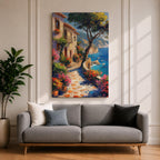 This artwork depicts a Mediterranean coastal scene featuring a charming seaside pathway lined with vibrant flowers and rustic buildings. The textured brushstrokes create a lively impressionistic landscape with a tree in the foreground and boats floating on the blue sea, capturing the essence of coastal tranquility.