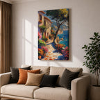 This artwork depicts a Mediterranean coastal scene featuring a charming seaside pathway lined with vibrant flowers and rustic buildings. The textured brushstrokes create a lively impressionistic landscape with a tree in the foreground and boats floating on the blue sea, capturing the essence of coastal tranquility.