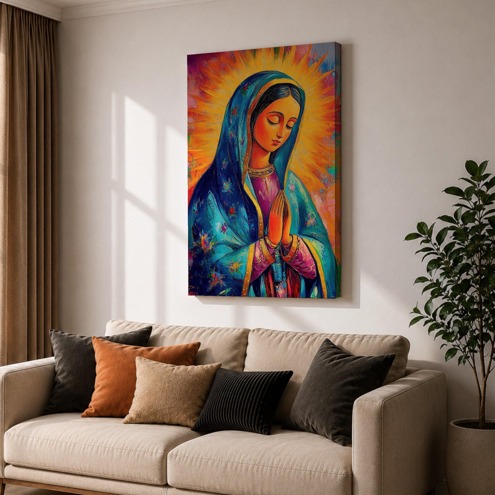Colorful devotional painting of Our Lady of Guadalupe shown with hands clasped in prayer, wearing a blue star covered mantle over a rose dress while radiant golden rays form a glowing halo behind her figure. The composition presents the Virgin Mary in a vibrant painterly style with bold brushstrokes and centered sacred portrait.