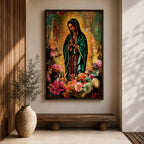 Devotional painting of Our Lady of Guadalupe standing with hands clasped in prayer, wearing a dark green star patterned mantle over a red dress and surrounded by radiant golden rays. The composition features colorful blooming flowers in the foreground framing the Virgin Mary in a vibrant painterly religious portrait.