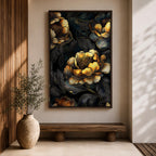 A detailed framed canvas artwork featuring large peony flowers with intricate petals and leaves in a botanical floral style. The composition highlights the natural form of peonies with a dark background that enhances the floral elements, creating a striking and elegant floral piece.