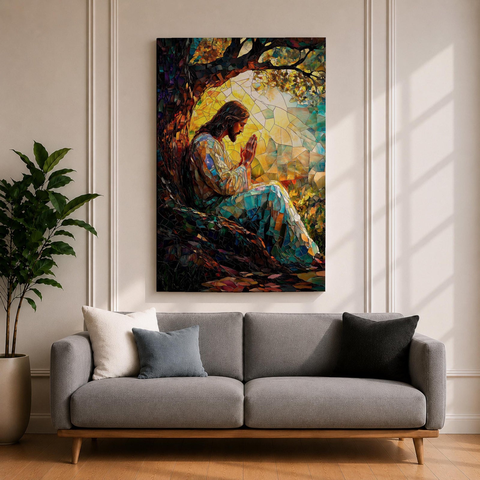 Mosaic style artwork of Jesus Christ seated beneath a large tree with hands joined in prayer, rendered in a stained glass inspired composition with colorful tessellated pieces forming his robe, the tree branches, and a glowing sunrise behind him, creating a devotional Christian scene with strong light and intricate mosaic detailing.