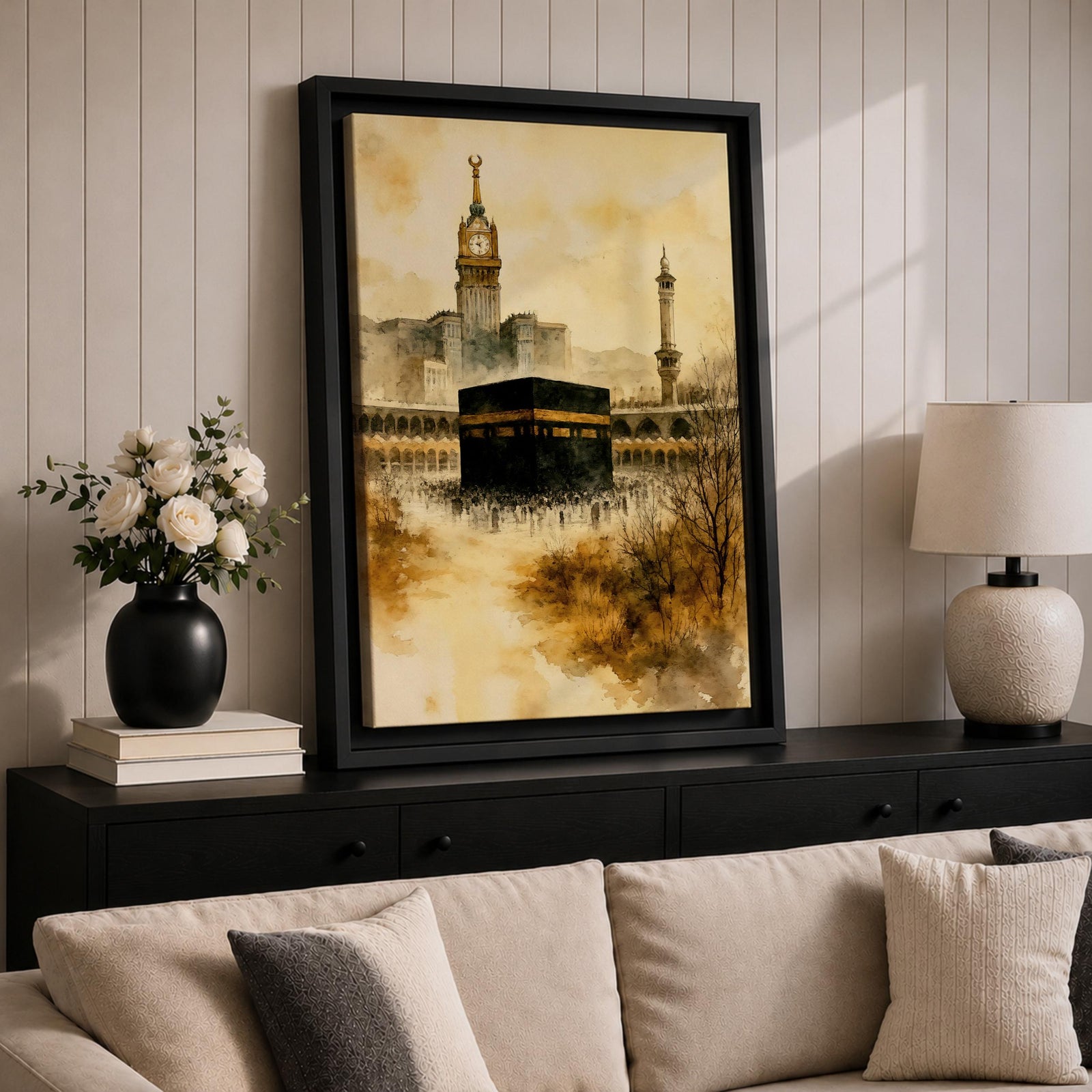 Soft watercolor artwork depicting the Kaaba at the center of Masjid Al Haram in Mecca, with the Abraj Al Bait clock tower and a tall minaret rising behind the mosque’s arches, rendered in warm sepia tones and fluid brushstrokes that create a peaceful and reverent atmosphere around the sacred Islamic landmark.