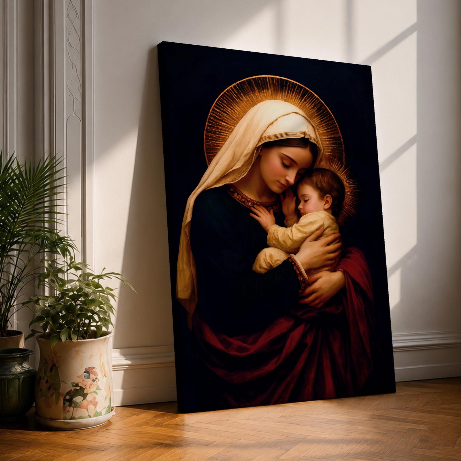 A vintage style framed canvas depicting Virgin Mary holding baby Jesus, both with radiant halos. The image features traditional Catholic iconography with detailed, soft textures and warm tones emphasizing the sacred mother and child portrait.
