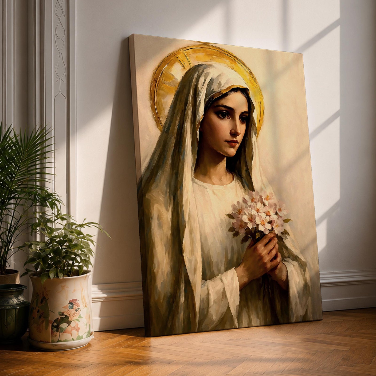 A vintage-style painting of the Virgin Mary depicted as Our Lady of Grace, holding a bouquet of flowers, with a golden halo behind her head. The artwork features soft, realistic brushwork and a classic religious portrait style emphasizing serenity and devotion.