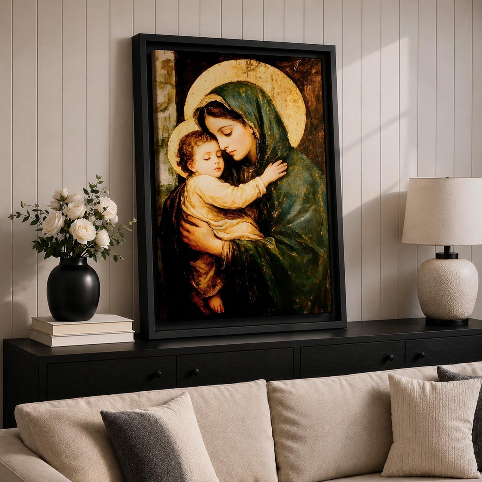 Painting of the Virgin Mary gently holding the sleeping baby Jesus in her arms, both figures shown with soft golden halos while Mary wears a green mantle and tenderly embraces the child, rendered in a traditional devotional style emphasizing the Madonna and Child composition with warm tones and classic Christian iconography.