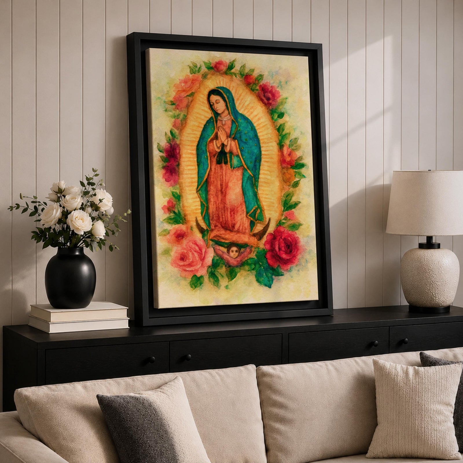Watercolor style depiction of Our Lady of Guadalupe standing in prayer within a glowing golden mandorla halo, wearing a teal mantle and rose colored robe while surrounded by blooming roses, with a small angel supporting the crescent moon beneath her in a traditional Catholic devotional composition.