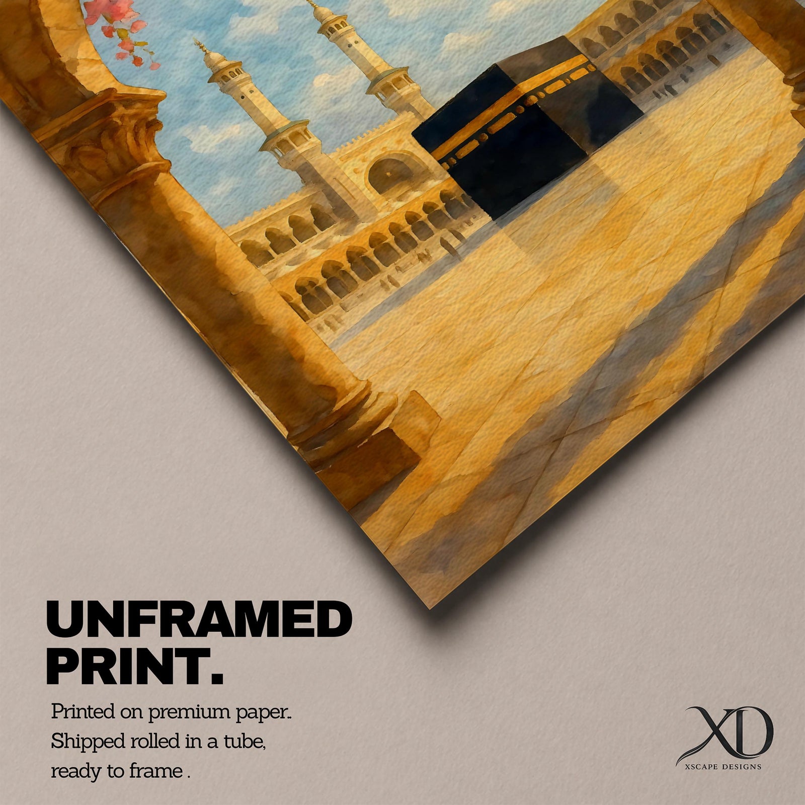 Watercolor artwork of the Kaaba inside Masjid Al Haram in Mecca, viewed through a warm stone archway draped with cascading pink flowers, with mosque colonnades and tall minarets rising in the background beneath a bright blue sky with soft clouds.