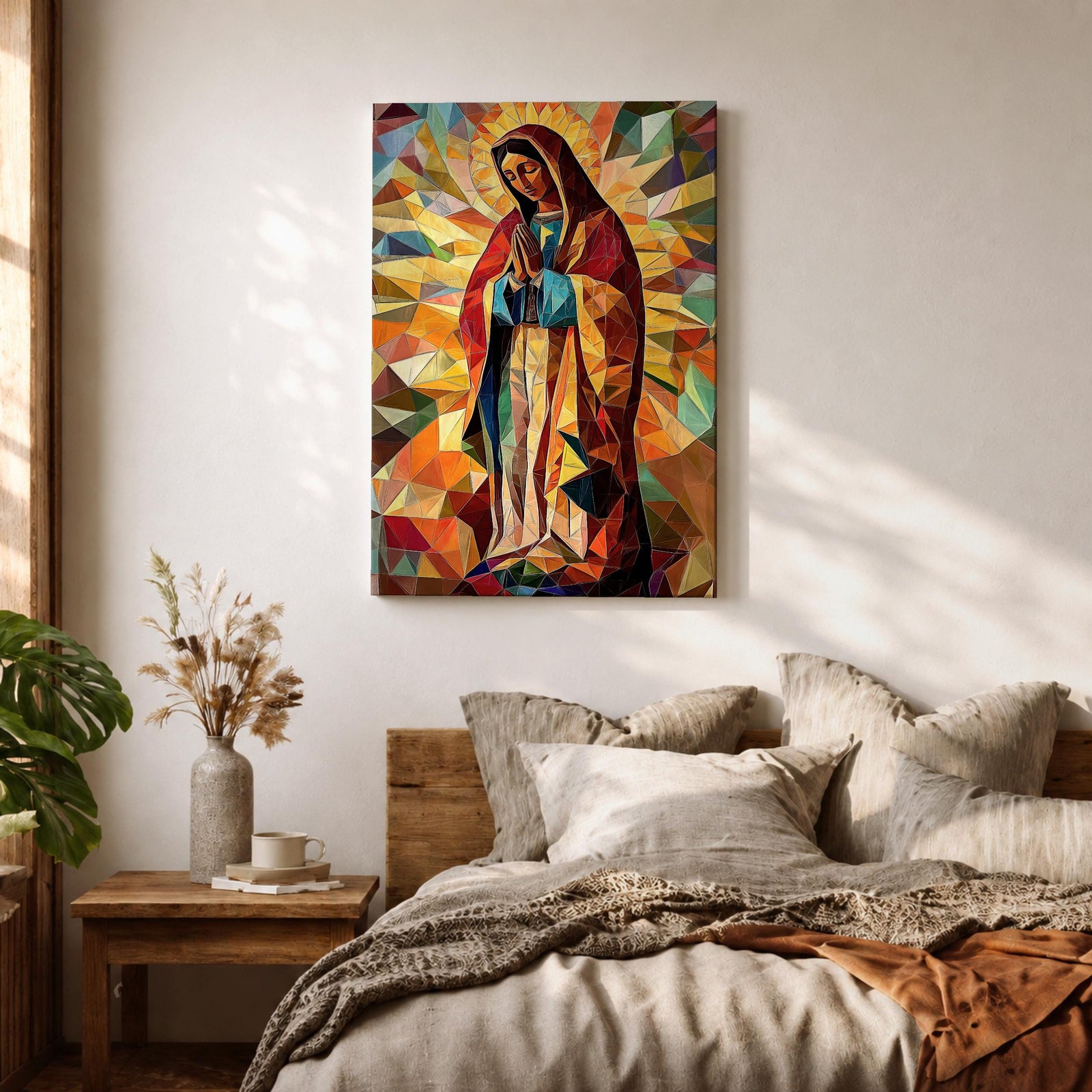 Geometric mosaic style depiction of Our Lady of Guadalupe shown standing in prayer with hands joined, surrounded by radiant golden halo rays and colorful angular shapes forming a stained glass inspired composition that highlights the Virgin Mary in a modern geometric Catholic devotional design.