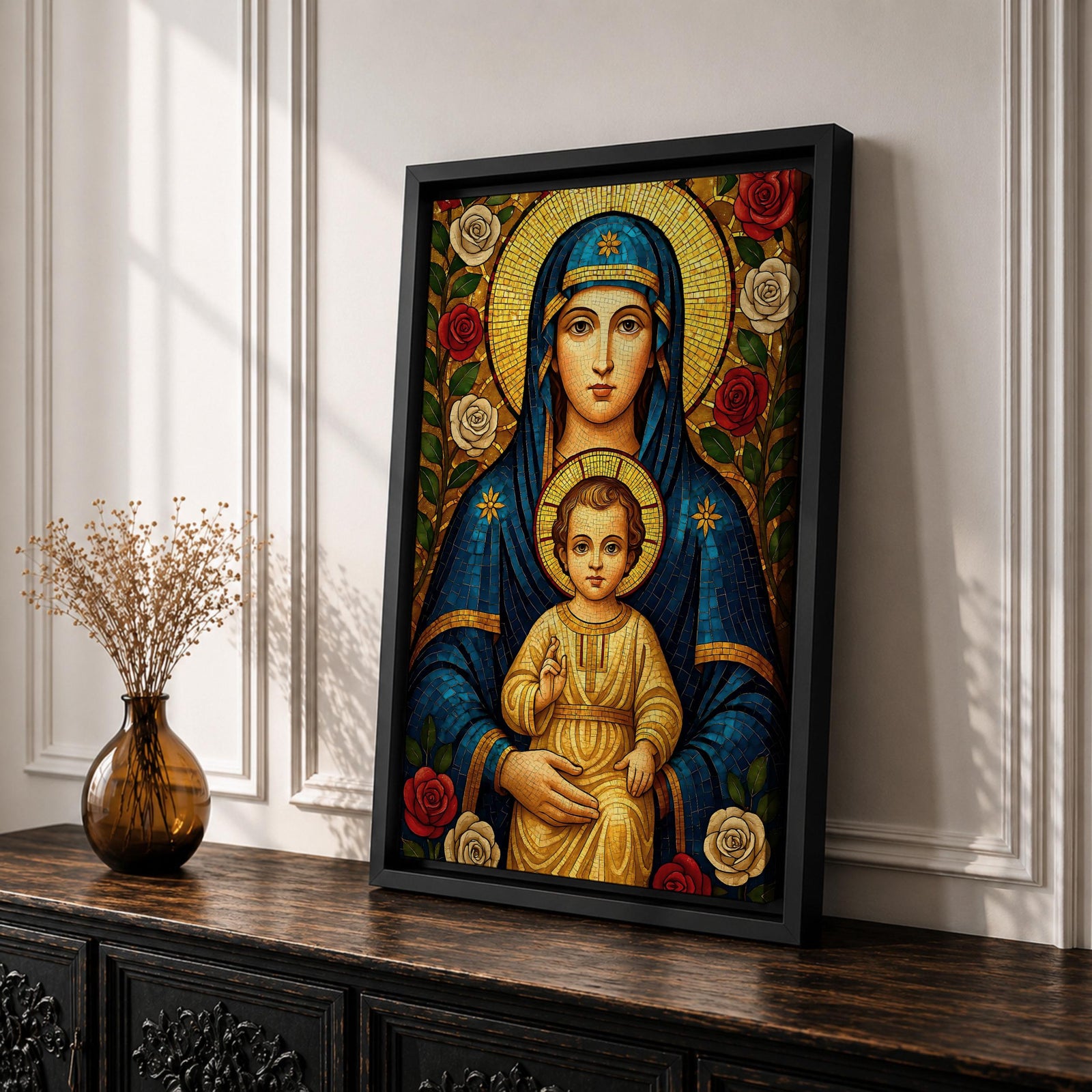 Mosaic icon style artwork of the Virgin Mary holding the child Jesus, both figures shown with golden halos while the infant Christ raises his hand in a blessing gesture, surrounded by red and white roses and intricate mosaic tesserae forming a traditional Catholic Madonna and Child composition.