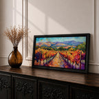 A panoramic vineyard landscape painting showing long rows of grapevines covered in red and golden autumn leaves stretching toward distant mountains beneath a bright sky. Purple grape clusters hang beside the vines while a central path leads through the field, capturing a colorful wine country valley with bold impressionist brushstrokes.