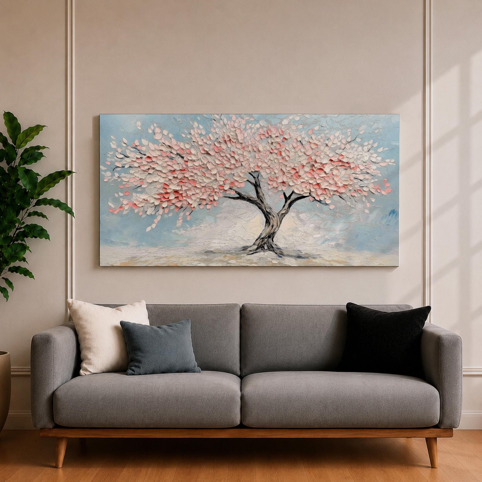 Panoramic textured painting of a cherry blossom tree with a twisting dark trunk and a wide canopy of soft pink blossoms spreading across a pale blue sky. Thick palette knife strokes create layered petals and raised textures, forming a calm spring landscape with delicate floral clusters and gentle pastel tones.