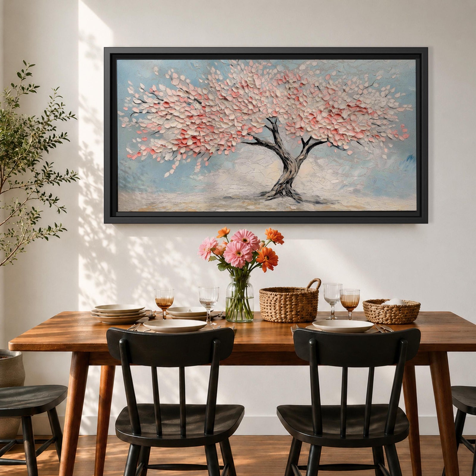Panoramic textured painting of a cherry blossom tree with a twisting dark trunk and a wide canopy of soft pink blossoms spreading across a pale blue sky. Thick palette knife strokes create layered petals and raised textures, forming a calm spring landscape with delicate floral clusters and gentle pastel tones.