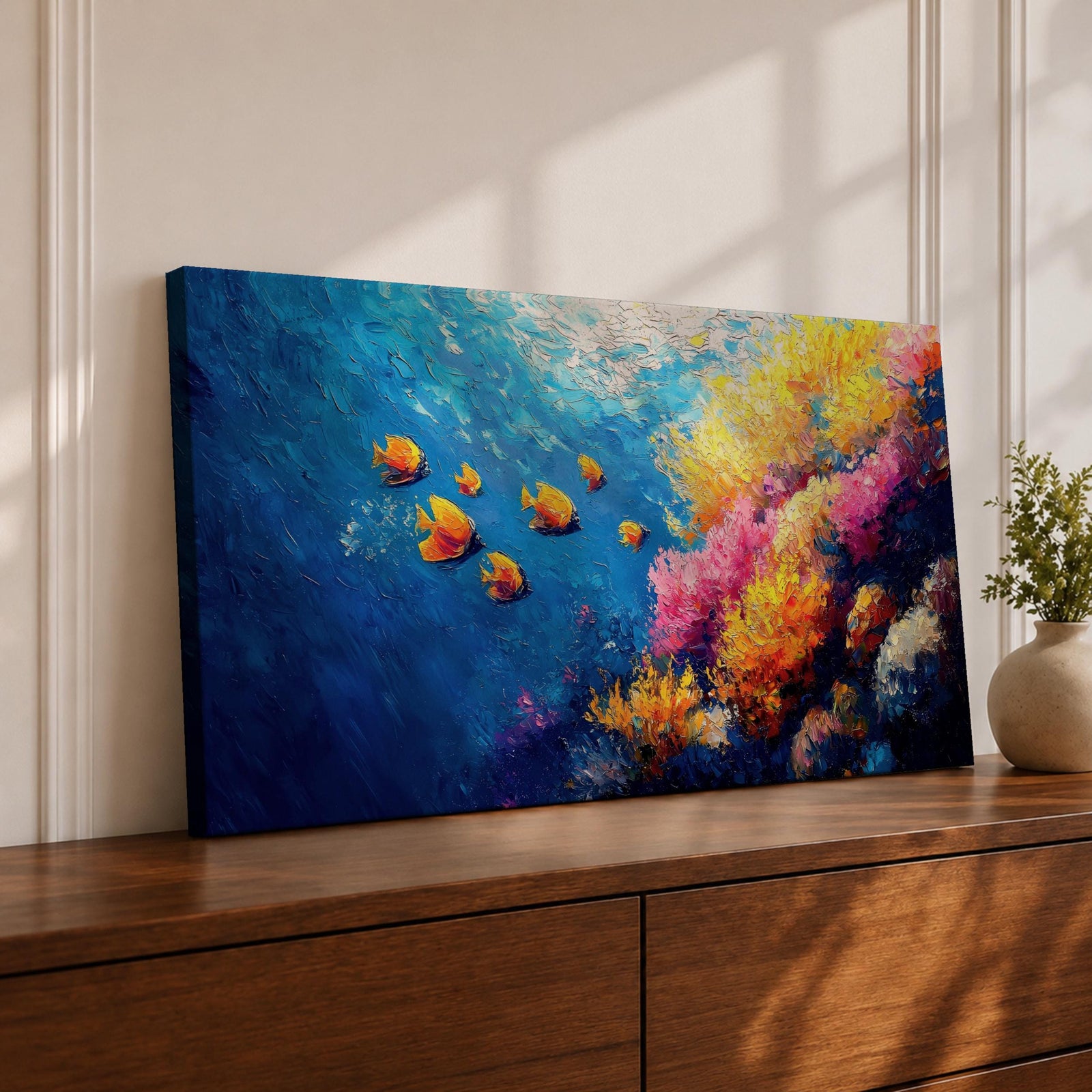 Panoramic painting of a vibrant coral reef scene with colorful tropical fish swimming through deep blue water. Bright coral formations in pink, orange, yellow, and purple spread across the seabed while small golden fish glide above the reef in a lively underwater composition.
