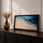 Panoramic painting of ocean waves rolling onto a sandy beach viewed from above. Thick textured brushstrokes form layered blue and turquoise surf breaking across the shoreline while white foam curls along the edge of the sand, creating a dynamic coastal seascape composition.