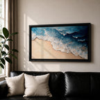 Panoramic painting of ocean waves rolling onto a sandy beach viewed from above. Thick textured brushstrokes form layered blue and turquoise surf breaking across the shoreline while white foam curls along the edge of the sand, creating a dynamic coastal seascape composition.