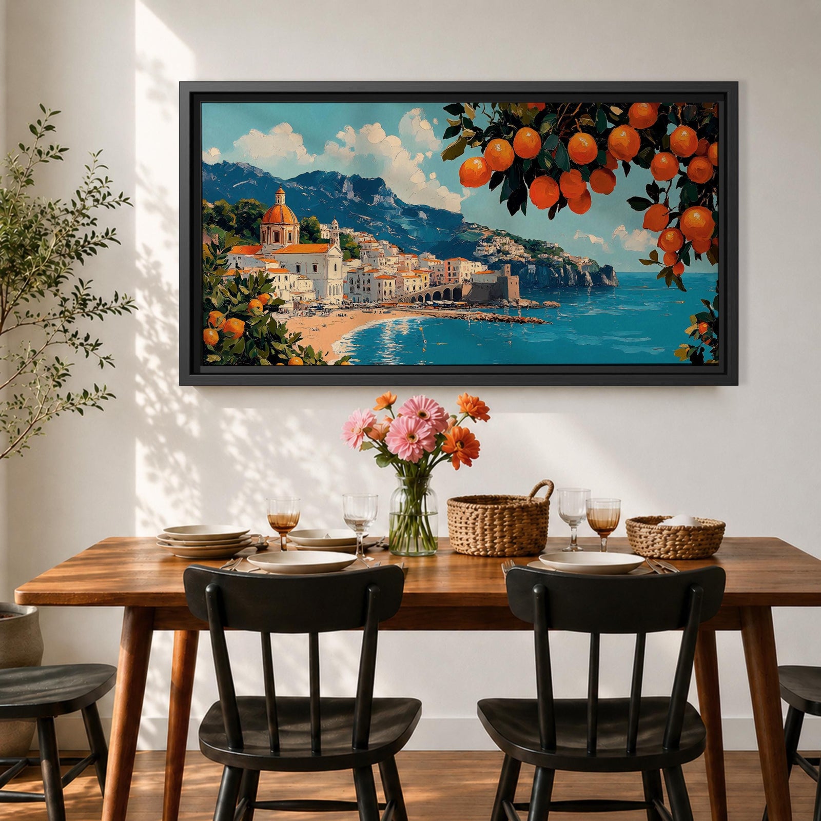 Panoramic painting of the Amalfi Coast with white seaside buildings and a domed church overlooking bright turquoise Mediterranean waters. Lemon branches heavy with citrus fruit frame the scene while mountains rise behind the coastal village beneath a blue sky with scattered clouds.