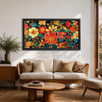 Panoramic illustration of a dense floral garden pattern filled with layered blossoms and detailed leaves. Large red, orange, yellow, and cream flowers spread across a dark background while teal foliage and curling botanical stems create an intricate decorative composition of overlapping garden blooms.