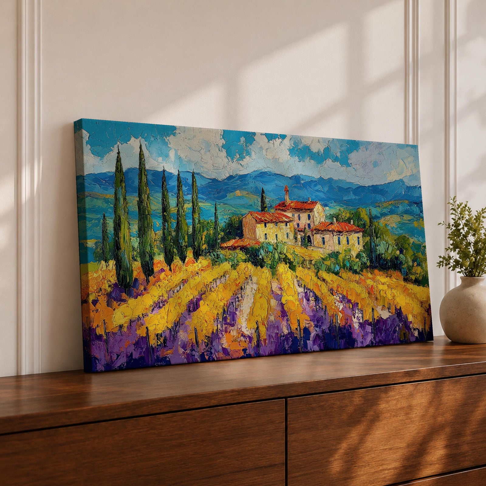 Panoramic painting of a Tuscany vineyard with golden rows of vines leading toward a rustic farmhouse and tall cypress trees. Rolling Italian hills stretch into the distance beneath a bright blue sky with textured clouds, while bold brushstrokes create a vibrant countryside landscape.