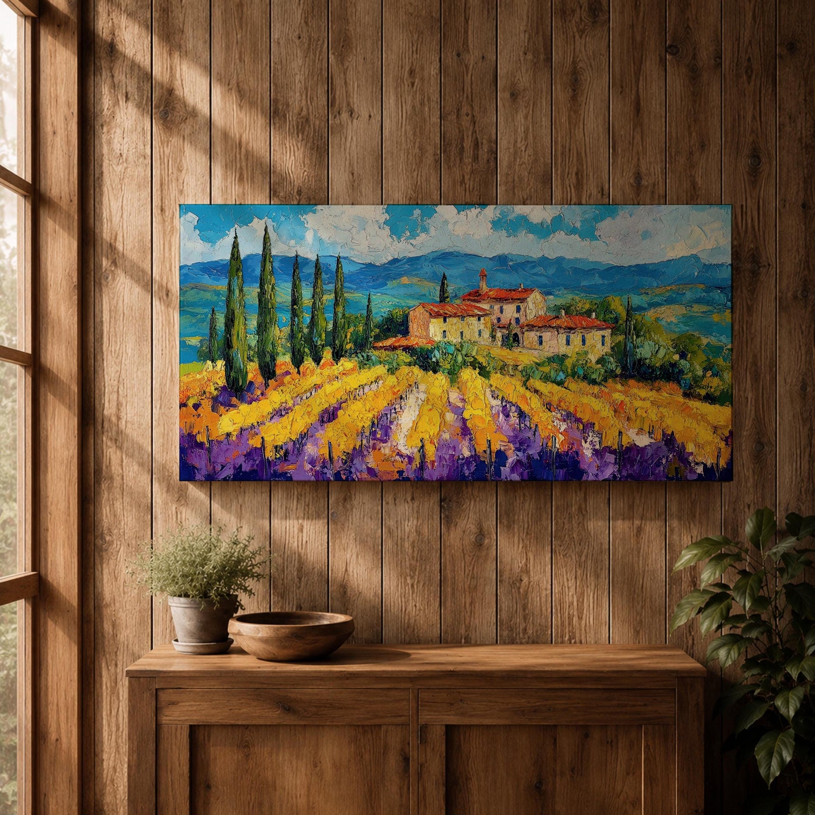 Panoramic painting of a Tuscany vineyard with golden rows of vines leading toward a rustic farmhouse and tall cypress trees. Rolling Italian hills stretch into the distance beneath a bright blue sky with textured clouds, while bold brushstrokes create a vibrant countryside landscape.