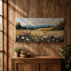 Panoramic painting of a peaceful wildflower meadow filled with blooming daisies and tall grasses across rolling countryside fields. Soft clouds stretch above distant hills while warm golden tones and textured brushstrokes create a calm rural landscape scene.