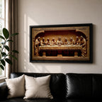 Panoramic relief artwork depicting the Last Supper with Jesus Christ seated at the center surrounded by the twelve apostles at a long table. The carved scene features classical biblical figures gathered in a detailed architectural setting.