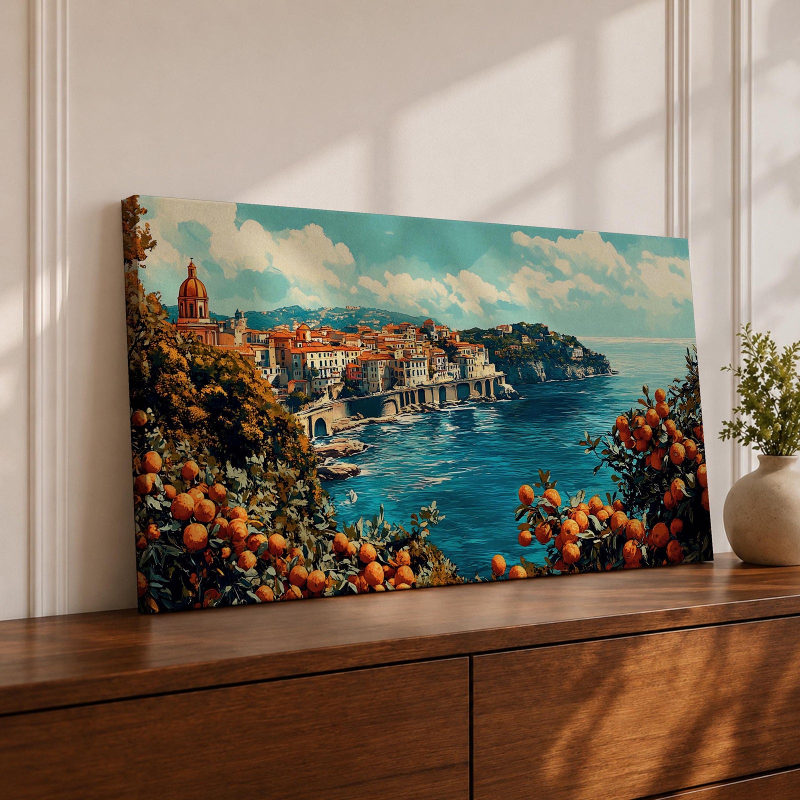 Panoramic painting of the Amalfi Coast overlooking the Mediterranean Sea with colorful Italian hillside buildings and citrus trees filled with ripe oranges in the foreground.