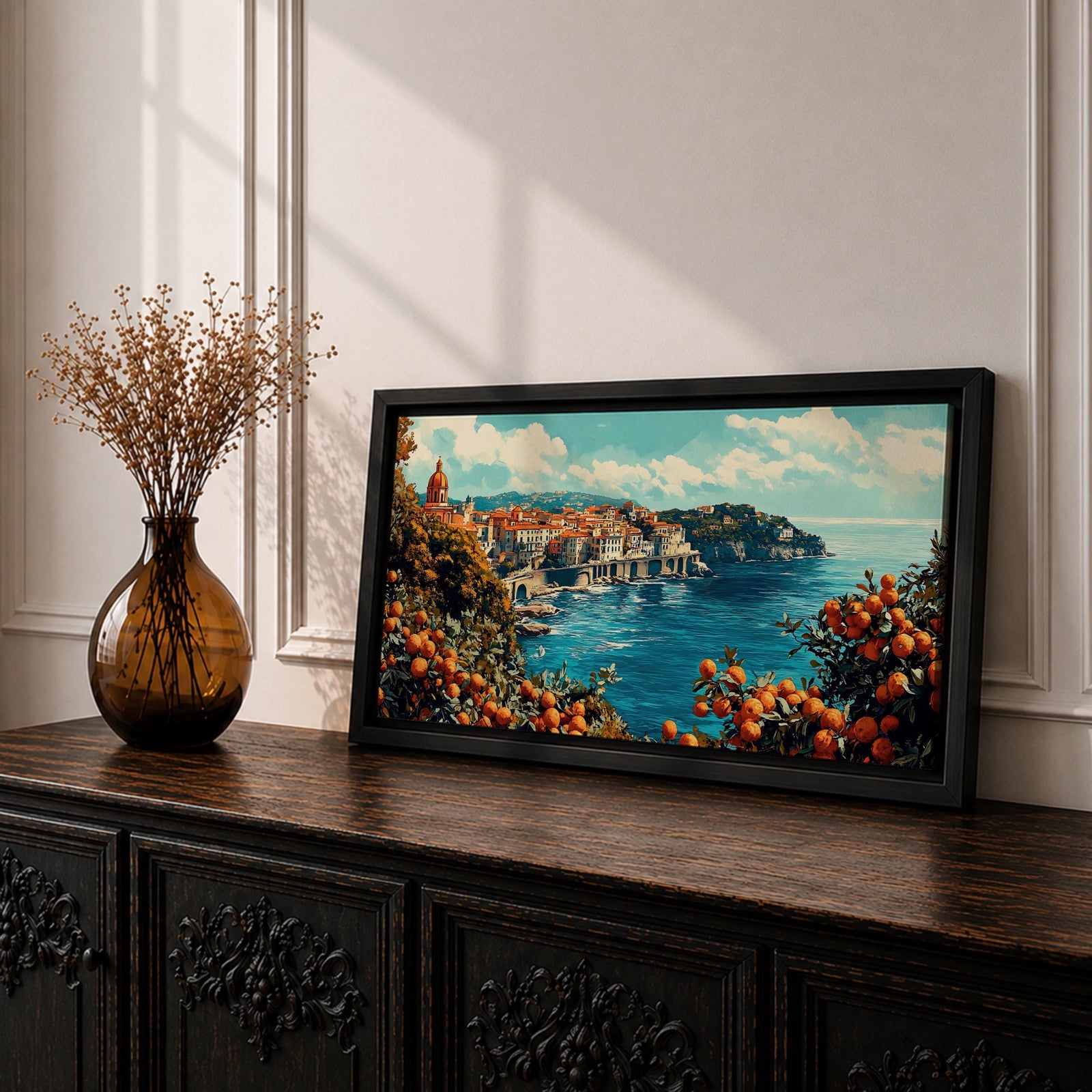Panoramic painting of the Amalfi Coast overlooking the Mediterranean Sea with colorful Italian hillside buildings and citrus trees filled with ripe oranges in the foreground.