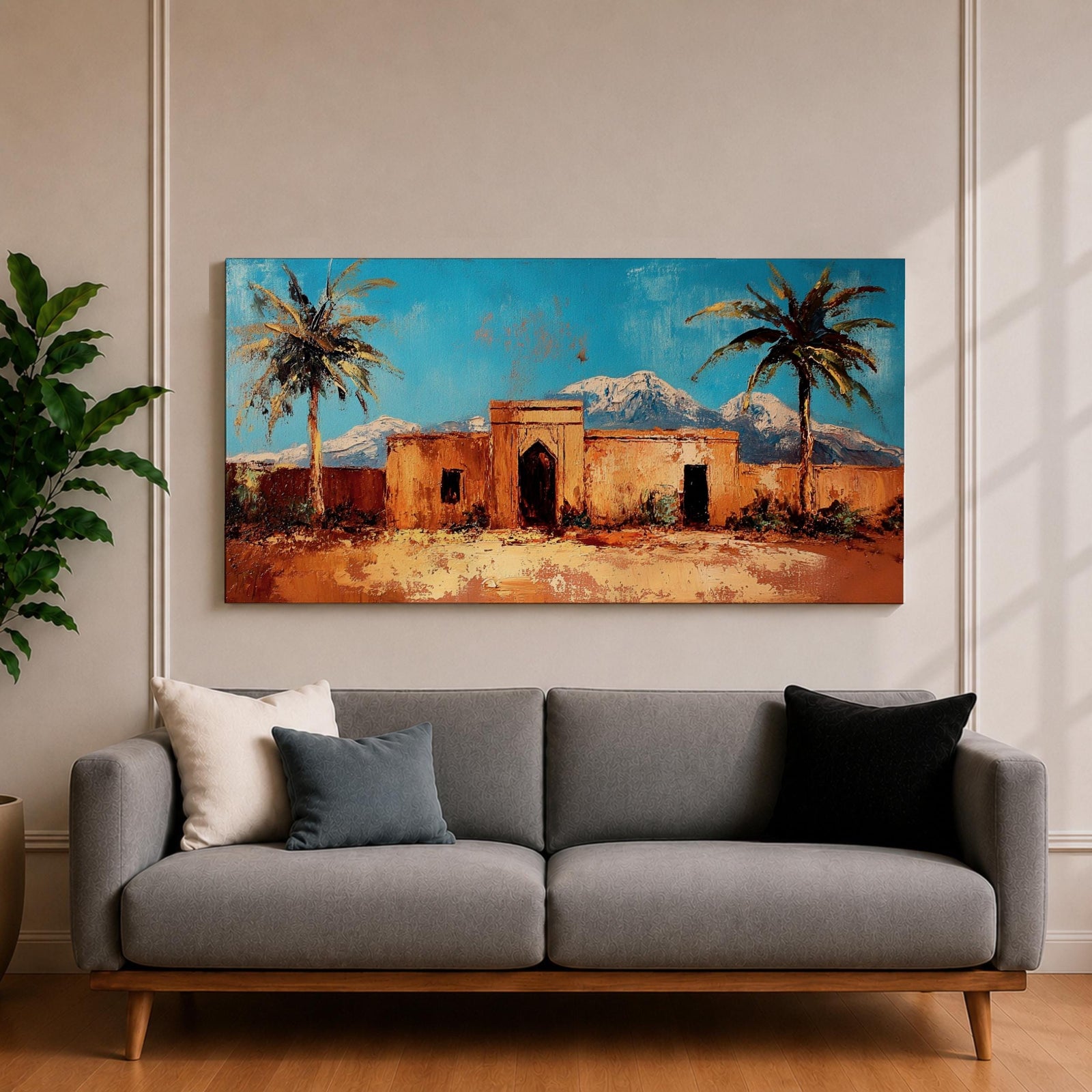 Panoramic painting of a Moroccan kasbah surrounded by palm trees in a desert oasis with the Atlas Mountains rising in the distance. The warm earthen architecture contrasts with a bright blue sky and textured brushstrokes capturing North African landscape scenery.
