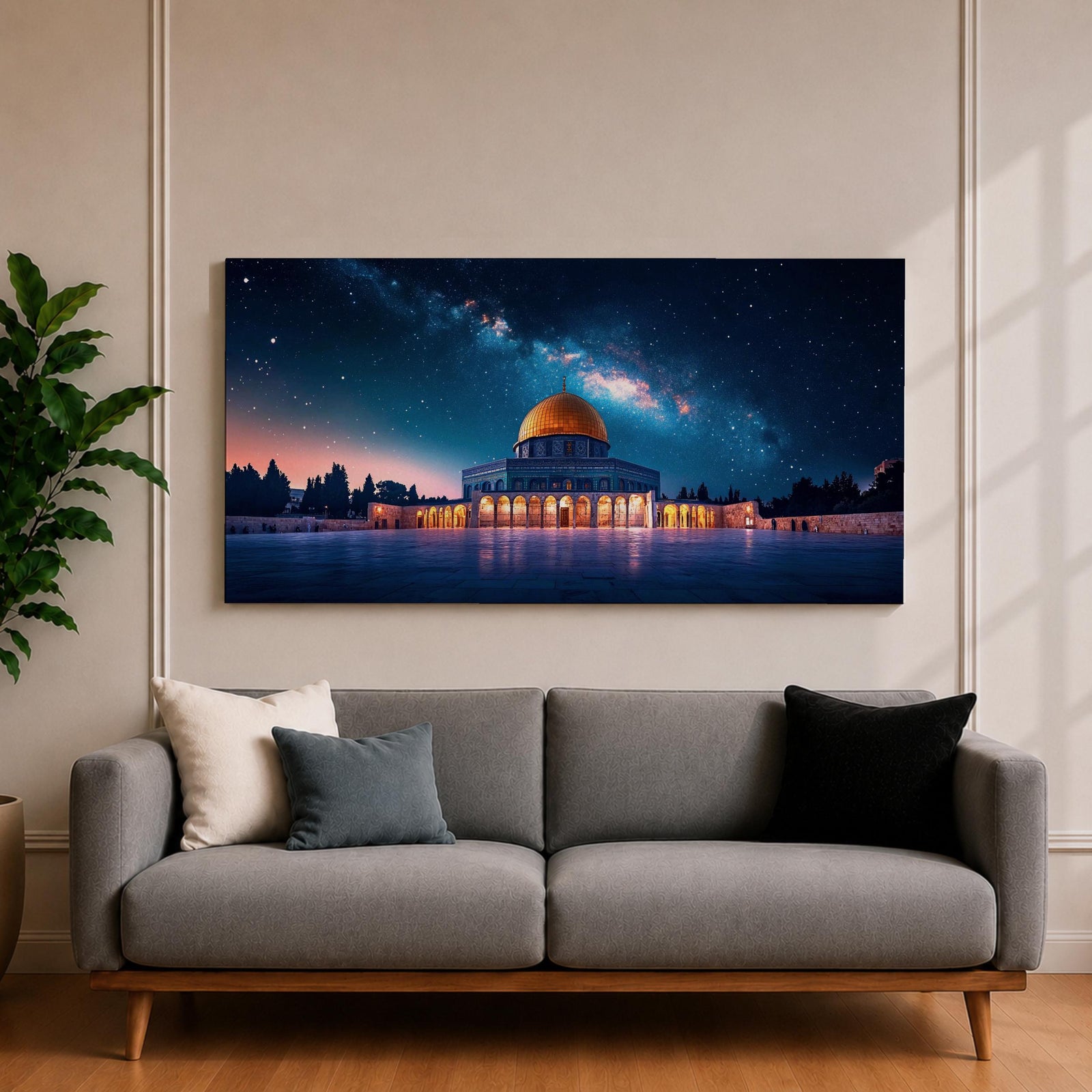 Panoramic night scene of the Dome of the Rock mosque in Jerusalem illuminated beneath a star filled sky and Milky Way galaxy. The golden dome reflects soft light across the courtyard while the historic Islamic architecture stands against the deep blue night horizon.