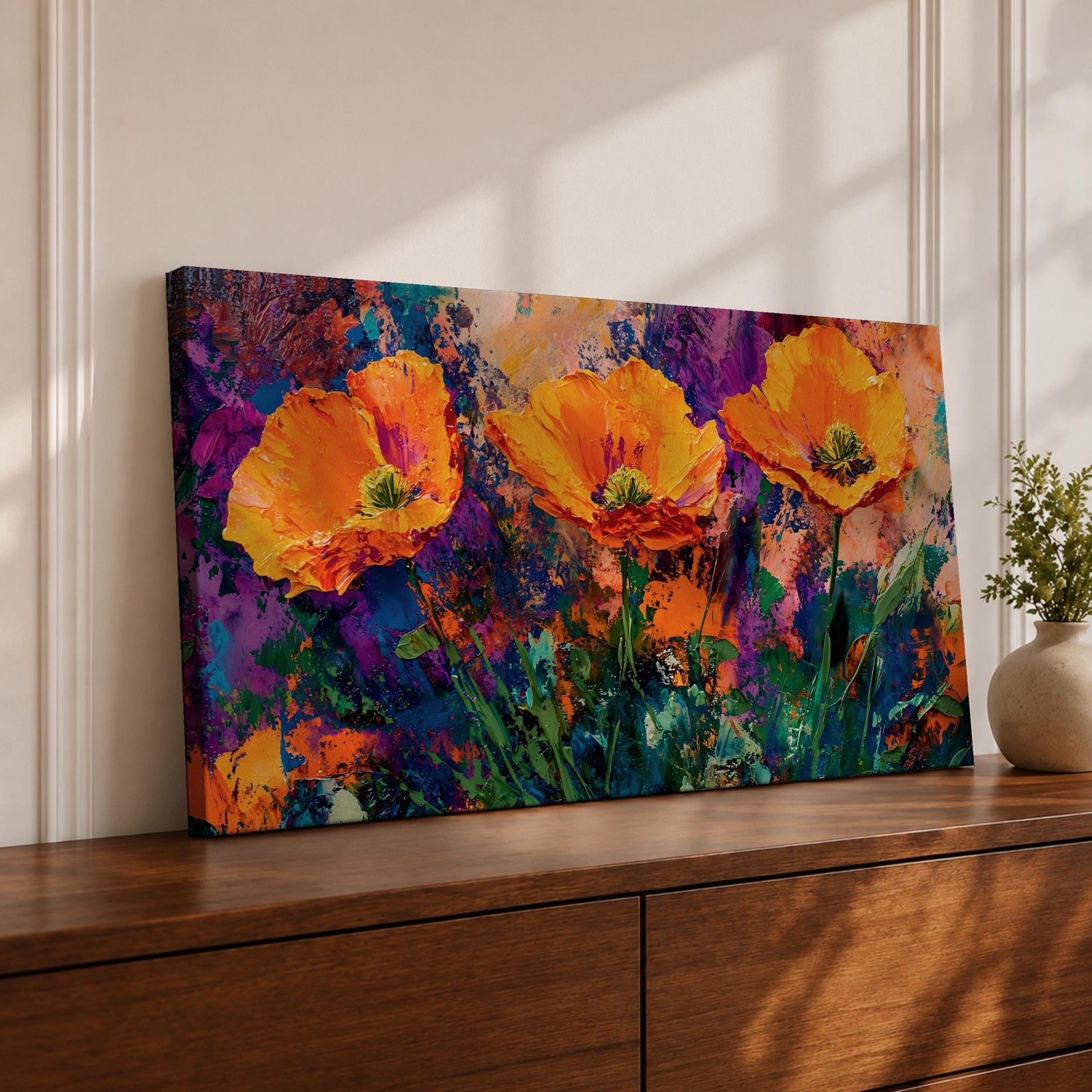 Panoramic painting of vibrant poppy flowers with bold orange petals rising from green stems against an expressive colorful abstract background filled with splashes of purple, blue, and gold tones.