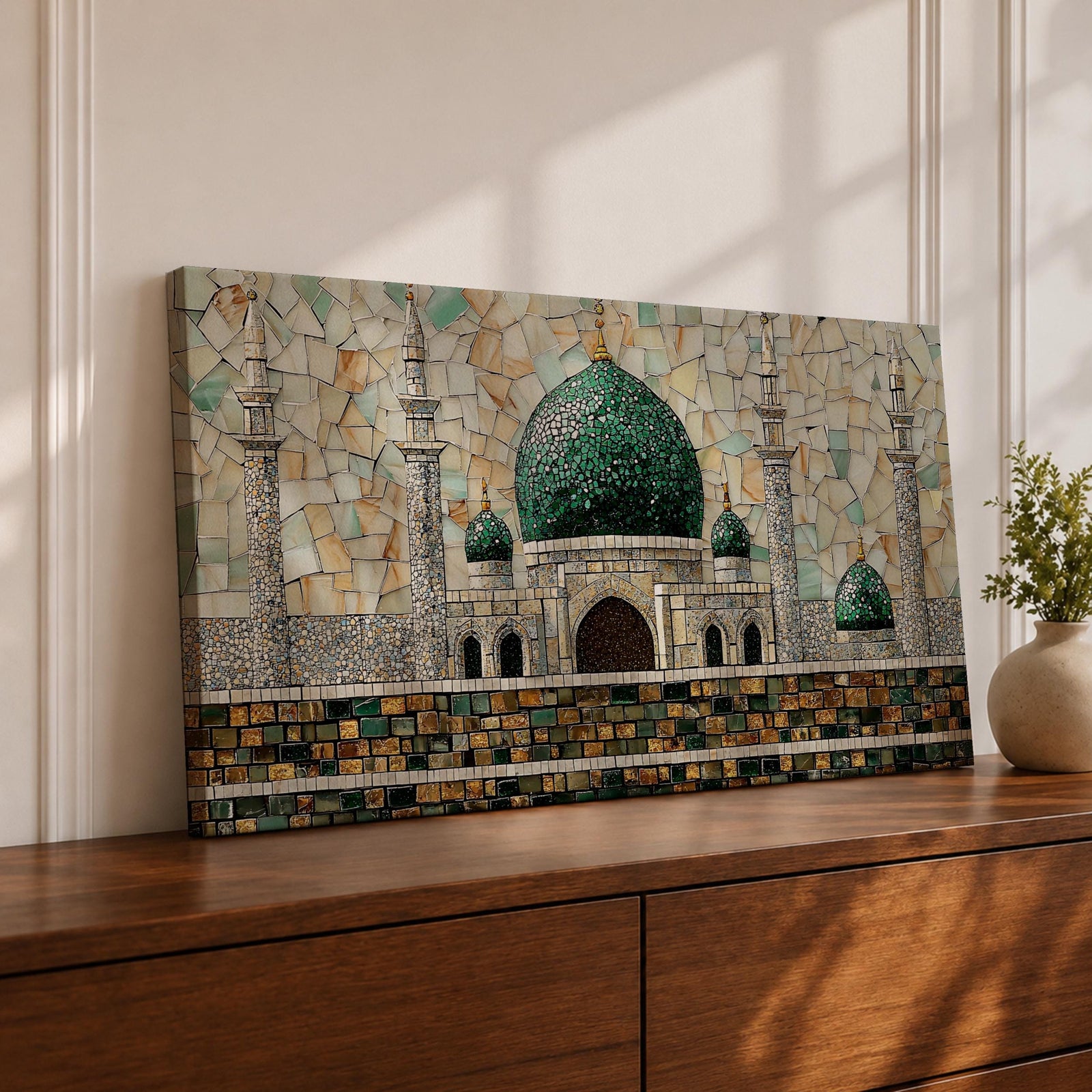Panoramic mosaic style artwork depicting Masjid Nabawi with its iconic green dome and surrounding minarets rising above detailed stone architecture. The scene is composed of small tile like shapes forming the mosque walls, domes, and decorative patterns, emphasizing the central green dome and symmetrical Islamic architecture.